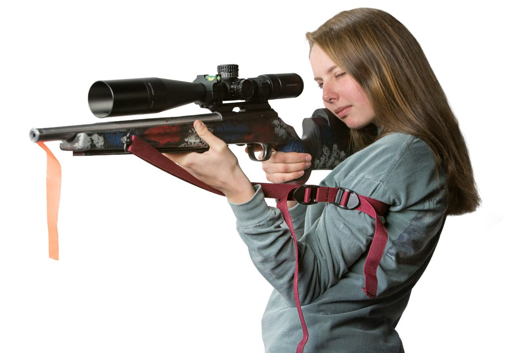Shooting looking down sight. Arm Braced with rifle sling. Simple Competition Rifle Sling - Sharps Mountain - SharpsMountain.com