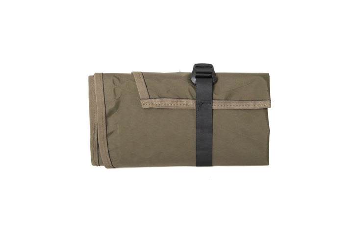 Suppressor Ready Rifle Cover folded and secured with an adjustable webbing strap.