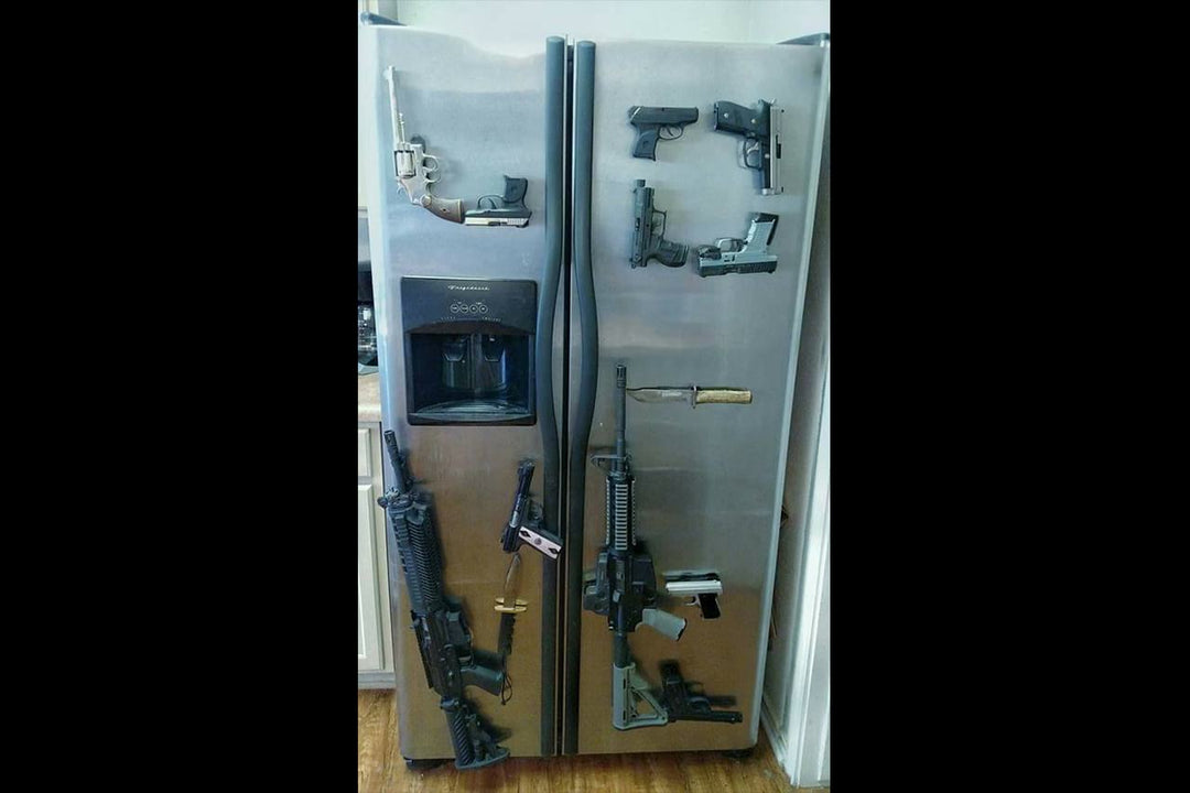Several weapons mounted to a refrigerator with go-magnets. Go-Magnets - Pistol Grab Mount - Sharps Mountain Outdoor Gear