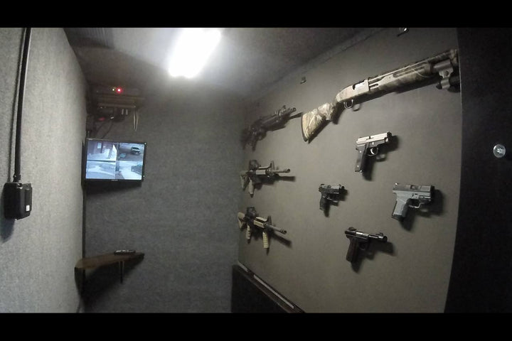 A walk in save with several guns mounted to the wall with go-magnets. Go-Magnets - Pistol Grab Mount - Sharps Mountain Outdoor Gear